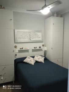 Posteľ alebo postele v izbe v ubytovaní Apartamento Solis