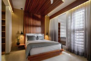 Een bed of bedden in een kamer bij Villa Nautica Boutique Hotel