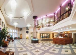 a lobby of a hotel with purple lighting at Bulgar Hotel in Kazan