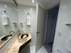 a bathroom with a sink and a shower at Buenos Aires desde las alturas in Buenos Aires +19 photos