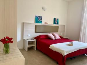 Postel nebo postele na pokoji v ubytování Crystal Camere