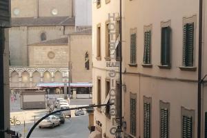 a view of a city street from a building at La Piccarda nel cuore di Firenze in Florence
