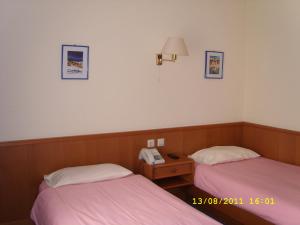 Letto o letti in una camera di Hotel de Foetz