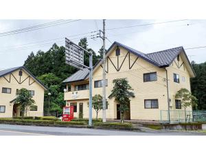 a large building on the side of a street at Sudomari no Yado Sunmore - Vacation STAY 46742v in Nikko