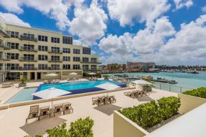 an image of the pool at the resort at Fully Smart Studio Apartment Harbor View in Oranjestad