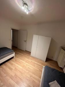 Ein Bett oder Betten in einem Zimmer der Unterkunft Zentral gelegene Apartments in Gelsenkirchen für bis zu 5 Personen