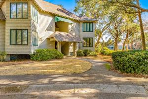 a house with a driveway in front of it at Tennis Club 4709 in Kiawah Island