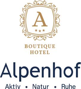 a luxury hotel logo with a crest at Boutique Hotel Alpenhof in Sankt Martin am Tennengebirge