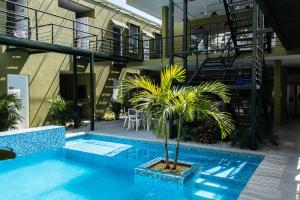 The swimming pool at or close to OASIS TROPICAL HOTEL