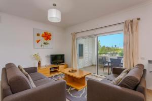 TV a/nebo společenská místnost v ubytování Âncora - Praia do Porto de Mós