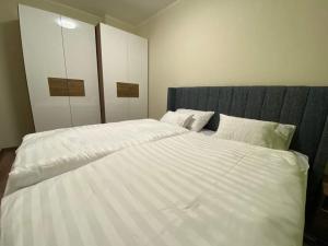 Postel nebo postele na pokoji v ubytování Diamond Apartment Budapest