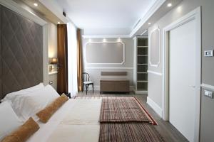Posteľ alebo postele v izbe v ubytovaní Hotel Campo Marzio