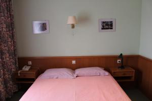 Letto o letti in una camera di Hotel de Foetz