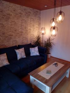 Posezení v ubytování Ferienwohnung Jungbär - Die Wohlfühl-Adresse im Stangenwald