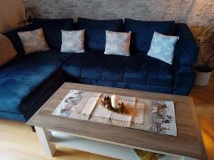 Posezení v ubytování Ferienwohnung Jungbär - Die Wohlfühl-Adresse im Stangenwald