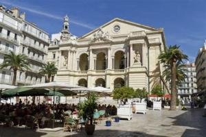 a large building with people sitting outside of it at Ode à l'amour : studio intimiste in Toulon