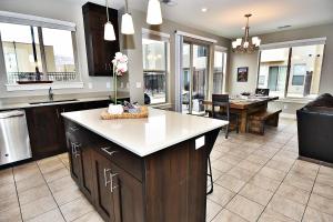 an open kitchen and living room with a dining room at Entrada at Moab 429 in Moab