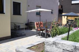 Patio nebo venkovní prostory v ubytování Ferienwohnung Jungbär - Die Wohlfühl-Adresse im Stangenwald