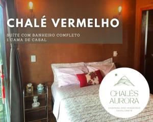a poster for a chale vermelho bedroom with a bed at Chalés Aurora in Cavalcante