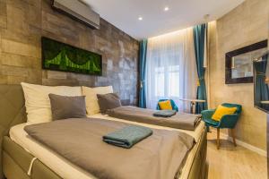 Posteľ alebo postele v izbe v ubytovaní Chain Bridge Studio Apartment
