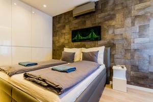 Posteľ alebo postele v izbe v ubytovaní Chain Bridge Studio Apartment