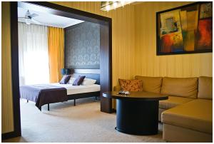 Łóżko lub łóżka w pokoju w obiekcie Hotel Iskierka Business & Spa