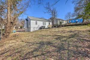 a house on top of a hill with a tree at Birmingham Home Walk to Ruffner Mountain! in Birmingham