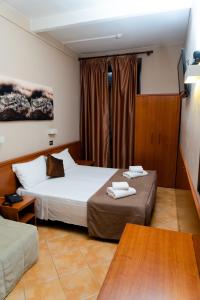Postel nebo postele na pokoji v ubytování Hotel Cervia