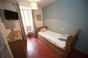 Cama o camas de una habitación en Château Ciceron