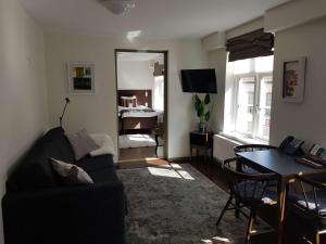 TV a/nebo společenská místnost v ubytování Best Western Plus Hotell Nordic Lund