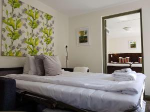 Postel nebo postele na pokoji v ubytování Best Western Plus Hotell Nordic Lund