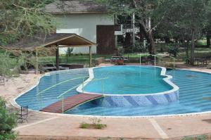 A piscina localizada em Hunters Lodge ou nos arredores
