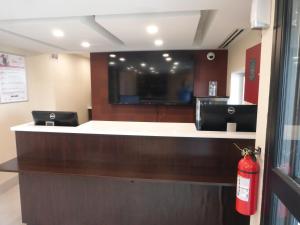 a waiting room with a fire hydrant in a hospital at Red Roof Inn Bourbonnais in Bourbonnais