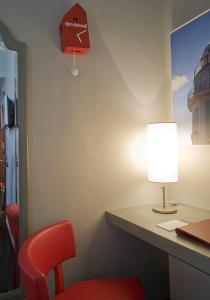 TV a/nebo společenská místnost v ubytování Hotel Rosso23 - WTB Hotels