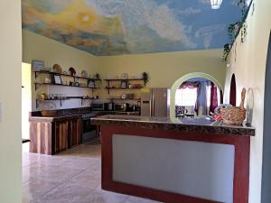 a kitchen with a counter top in a room at Southaven Oasis 