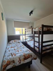 Postel nebo postele na pokoji v ubytování Lomas de Puyai