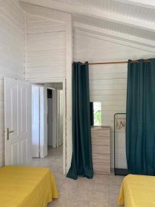 Letto o letti in una camera di VILLA KARAT