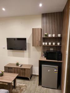 A cozinha ou kitchenette de STEPS IN Pyramids View