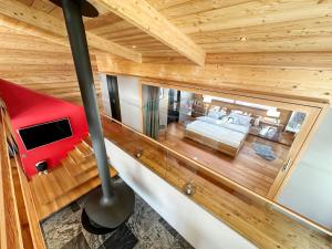 an overhead view of a bedroom in a tiny house at Crans Montana under the stars in Crans-Montana