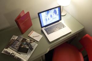 TV a/nebo společenská místnost v ubytování Hotel Rosso23 - WTB Hotels