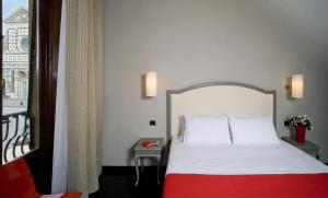 Postel nebo postele na pokoji v ubytování Hotel Rosso23 - WTB Hotels