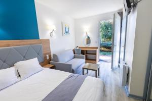 Postel nebo postele na pokoji v ubytování Le Clos Grand
