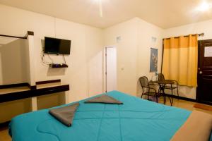 TV a/nebo společenská místnost v ubytování Serene Resort Koh Lipe