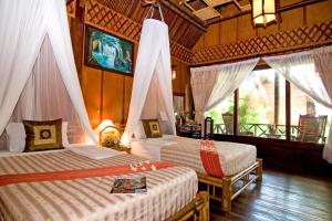 En eller flere senge i et værelse på Ocean Star Resort + 37 billeder