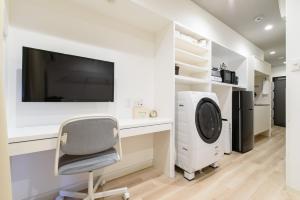 Kuchyň nebo kuchyňský kout v ubytování JP INN Kyoto Ekimae Izutsucho