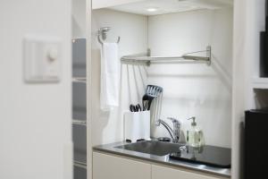 Kuchyň nebo kuchyňský kout v ubytování JP INN Kyoto Ekimae Izutsucho + 37 fotografií