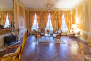 Posedenie v ubytovaní Chateau du Hallay