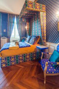Posteľ alebo postele v izbe v ubytovaní Chateau du Hallay