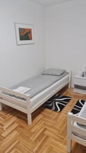 Posteľ alebo postele v izbe v ubytovaní South 2 Osijek