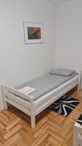Posteľ alebo postele v izbe v ubytovaní South 2 Osijek